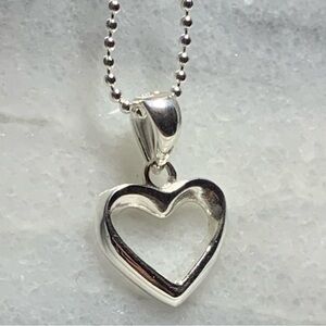 Sterling Silver Heart Pendant On 16” Chain